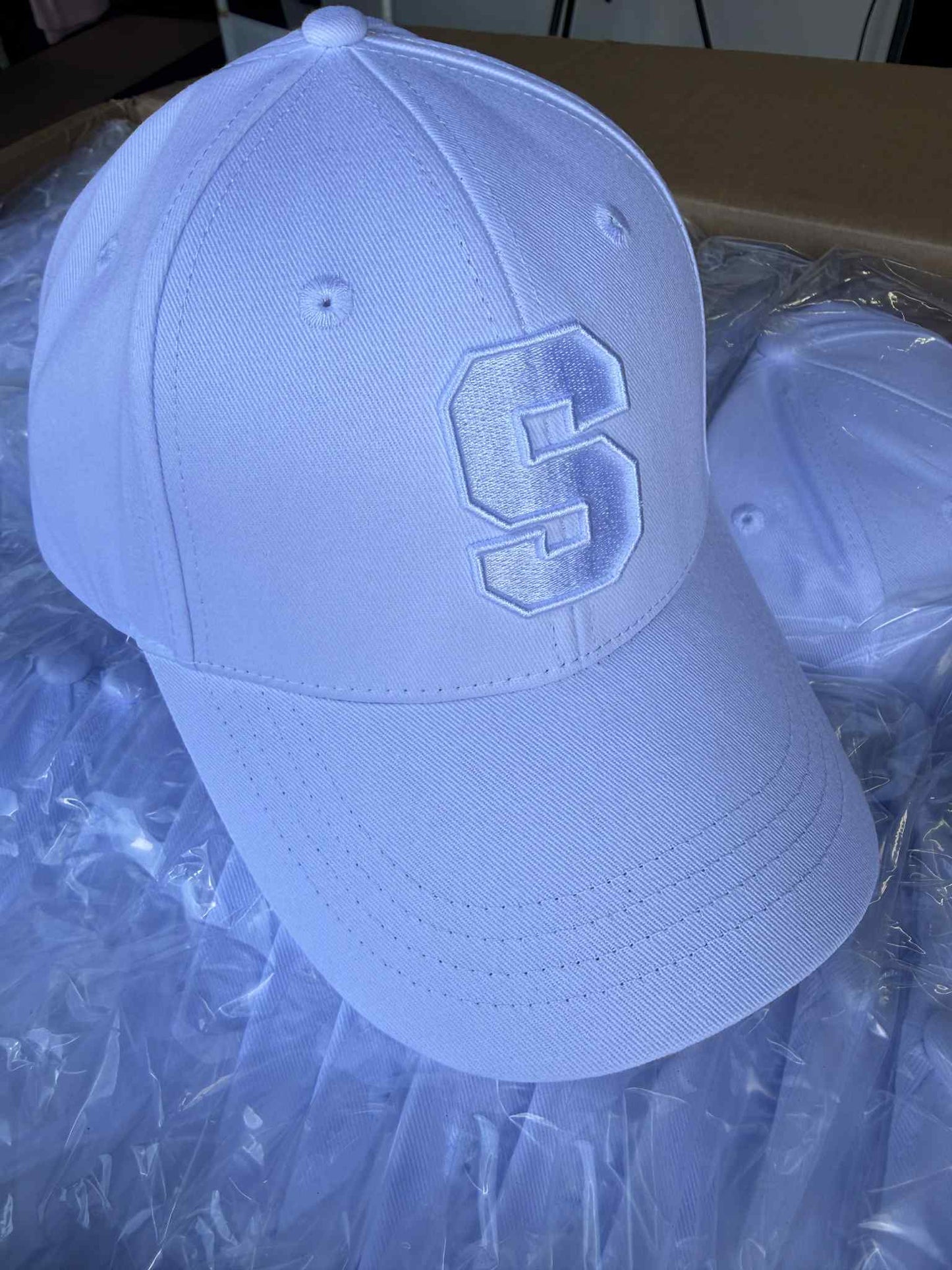 S Caps