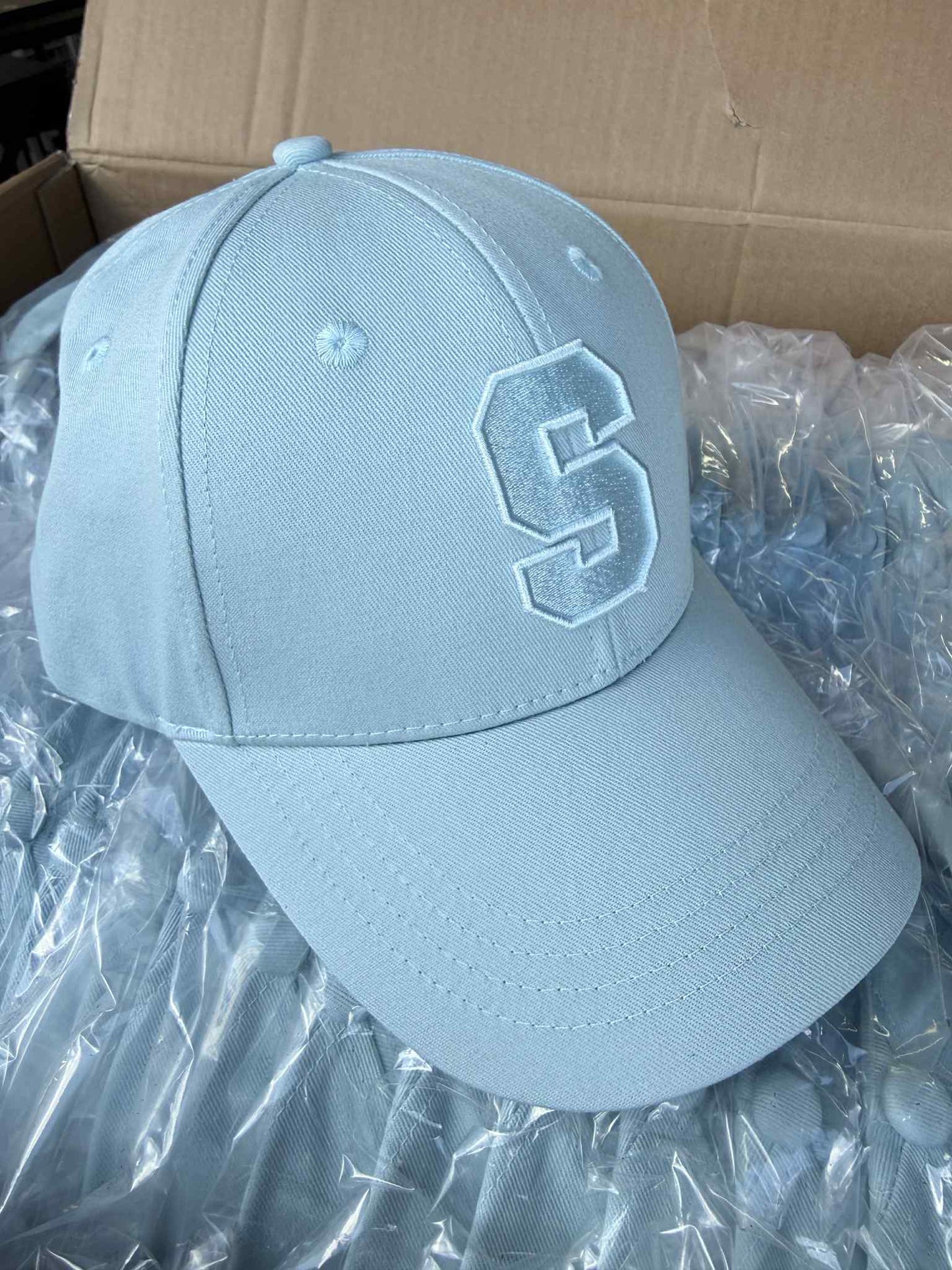 S Caps