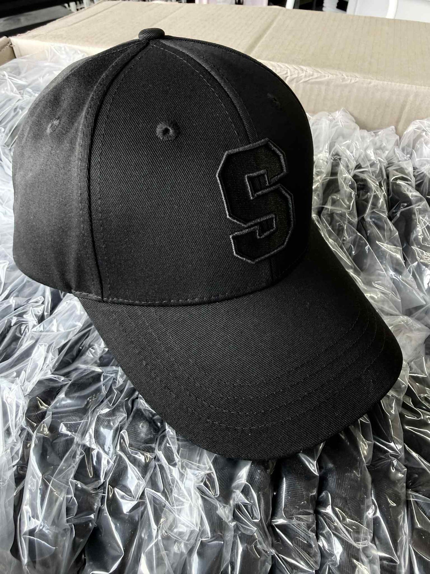 S Caps